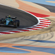 A photo of the Aston martin F1 car testing in Bahrain.